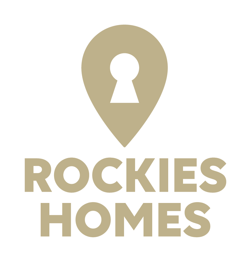 A green background with the words rockies homes in the middle.